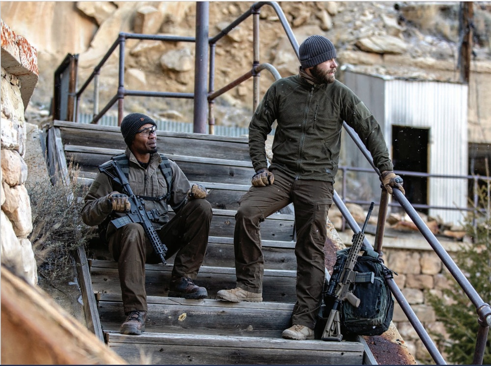 2 men sitting on stairs with CAR816 A2s